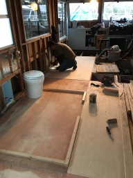 Laying down 3/4" marine grade plywood for our floor